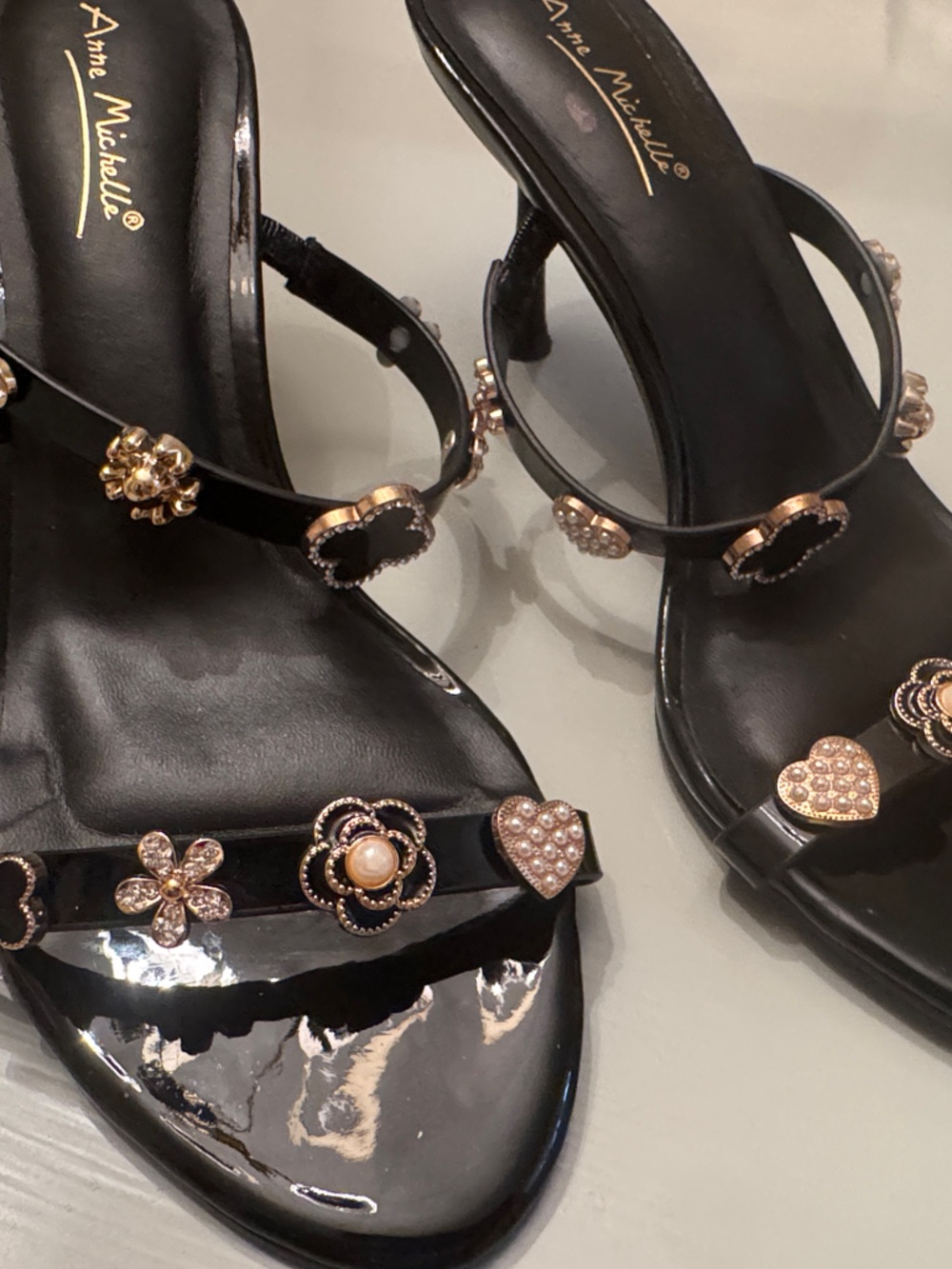 Anne Michelle Black Sandals with Gold Floral Embellishments